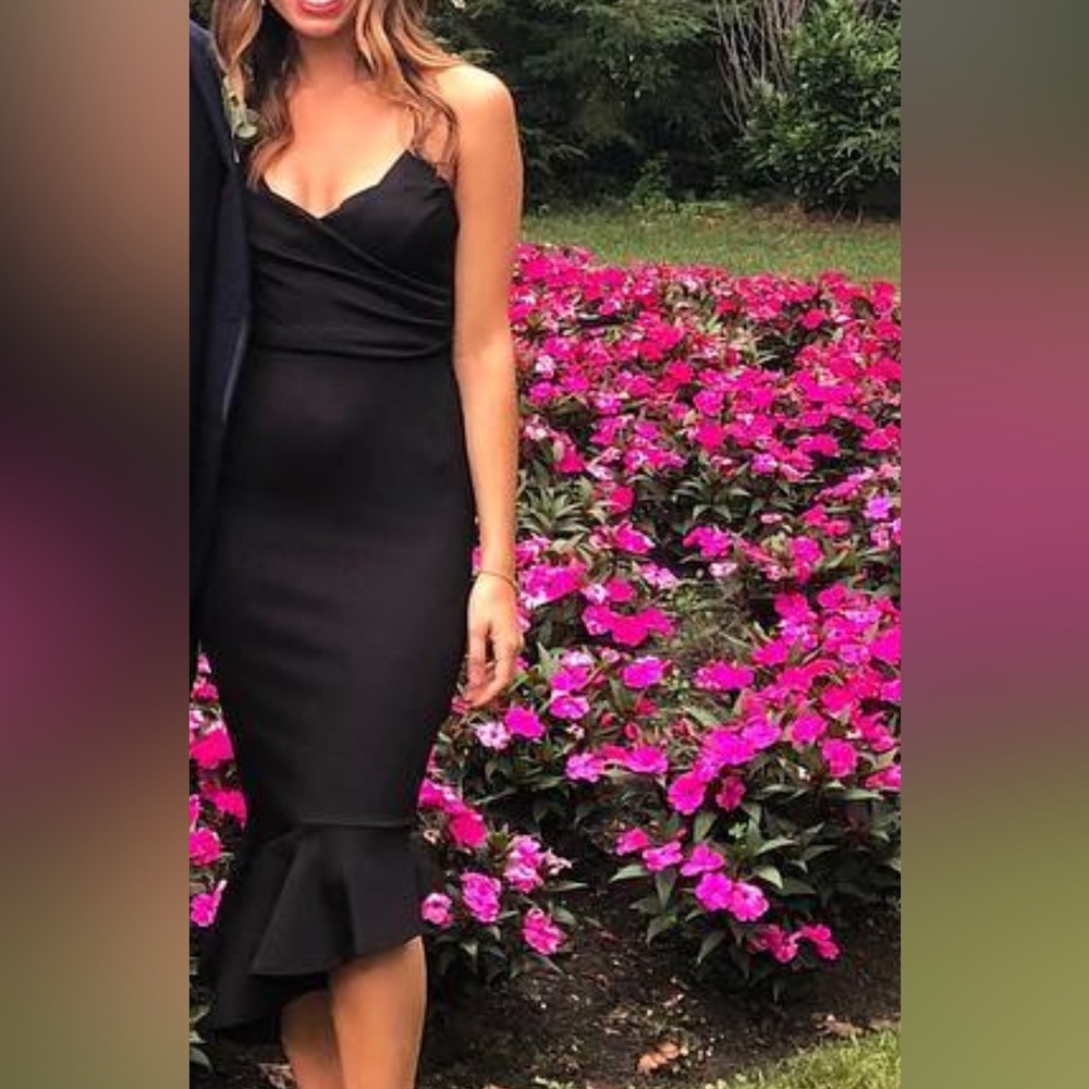 Elegant Black Dress with Ruffle Hem